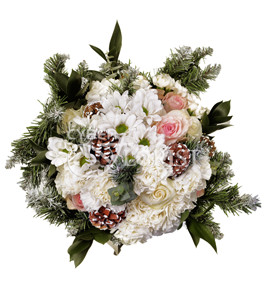 Winter Tale. An exquisite flower arrangement in white colors with Christmas decoration.